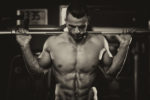 Watch this man shatter the world record for most squats in one minute!